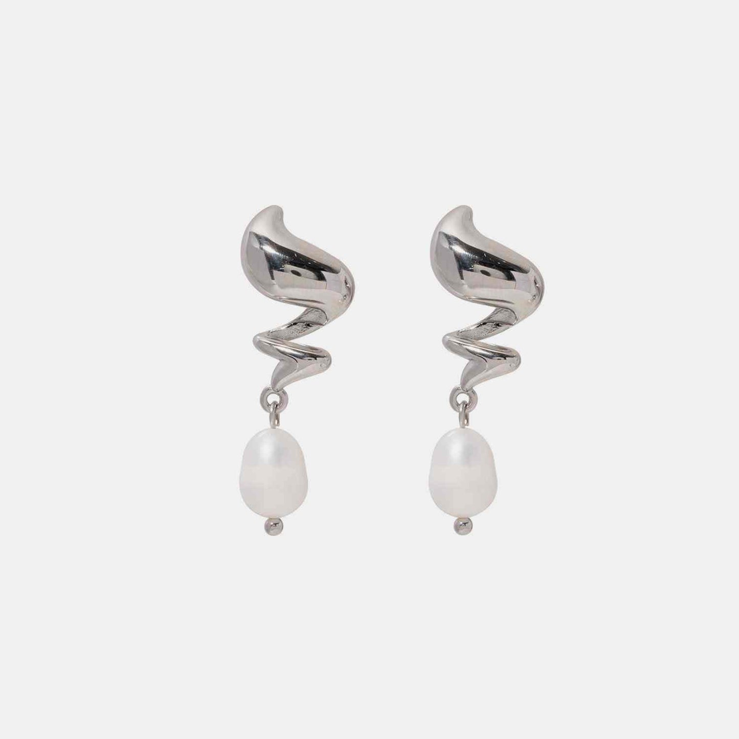 Twisted stainless steel earrings with freshwater pearl drops.