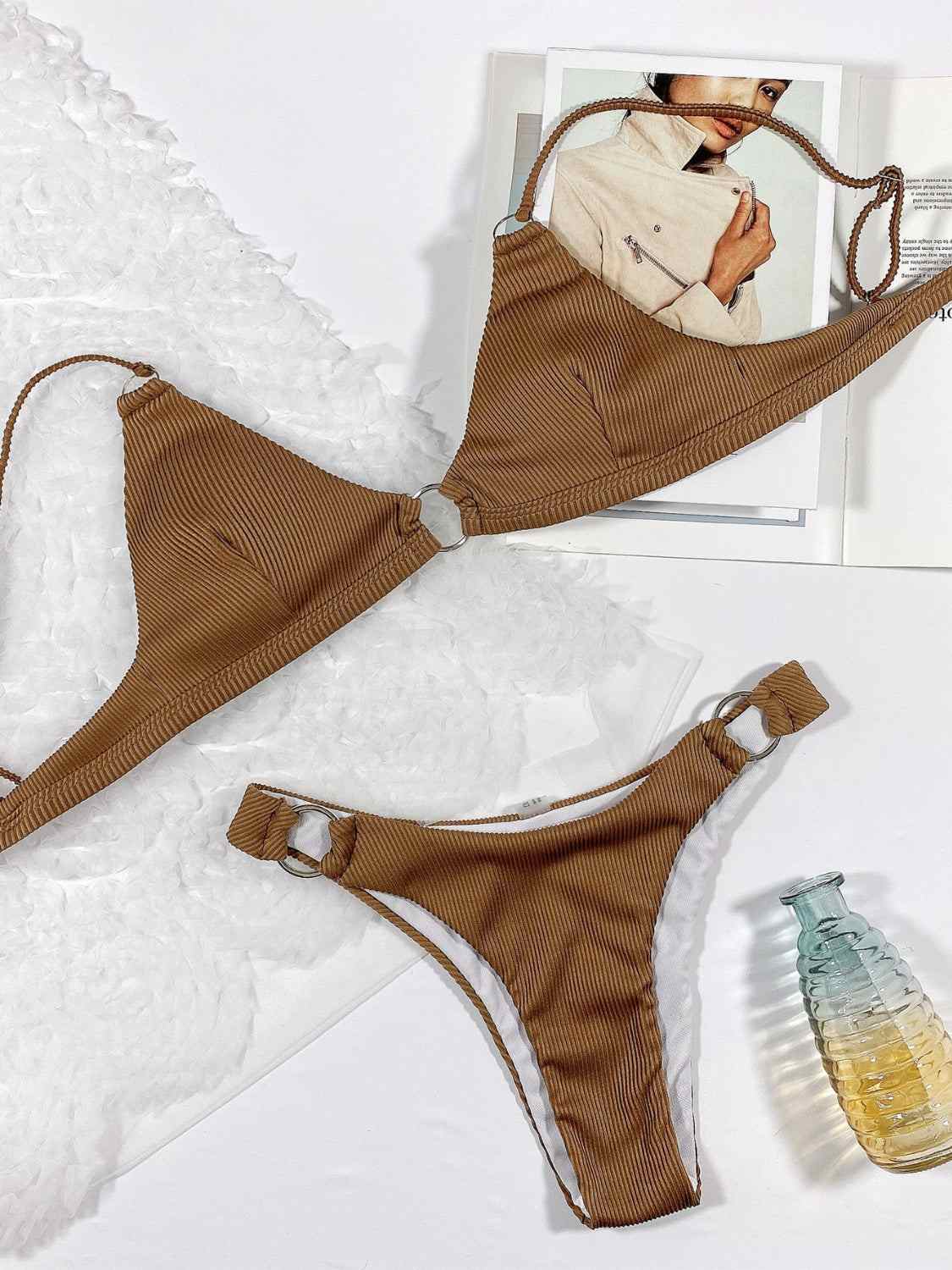 Plunge spaghetti strap swim set in brown with removable padding and stretchy fabric.