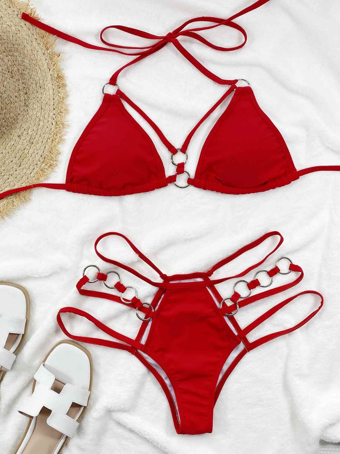 Cutout halter neck two-piece bikini set in red with removable padding and adjustable straps.