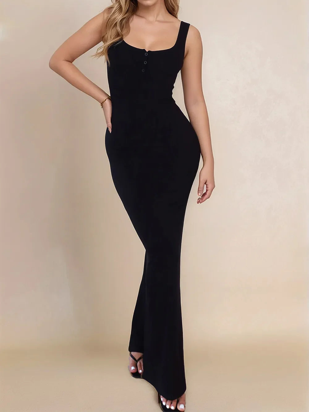Devine Side Slit Maxi Dress with wide straps in black, featuring a slit and button detail, made from viscose and elastane.