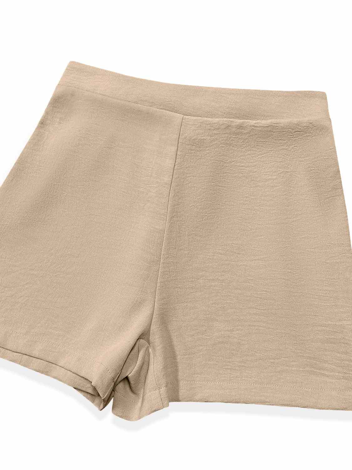 Beige shorts of the Spaghetti Strap Top and Shorts Set, featuring a basic style with slight stretch.