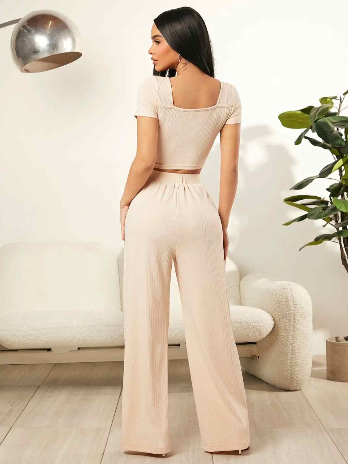 Square neck top and pants set in beige with moderate stretch.