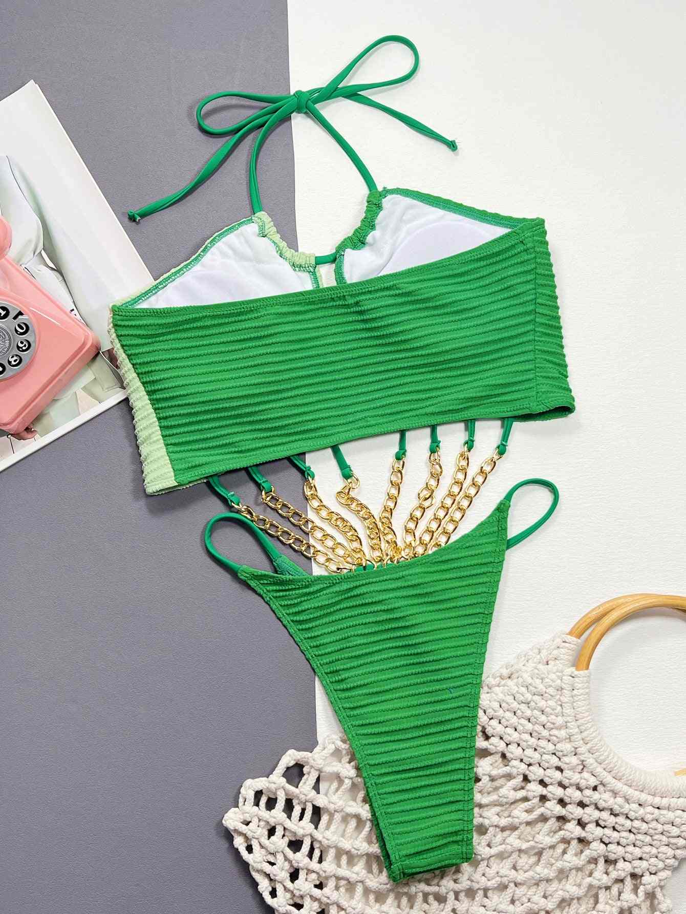 Contrast Halter Neck Chain Detail One-Piece Swimsuit in green, featuring removable padding and a tie halter neck design.