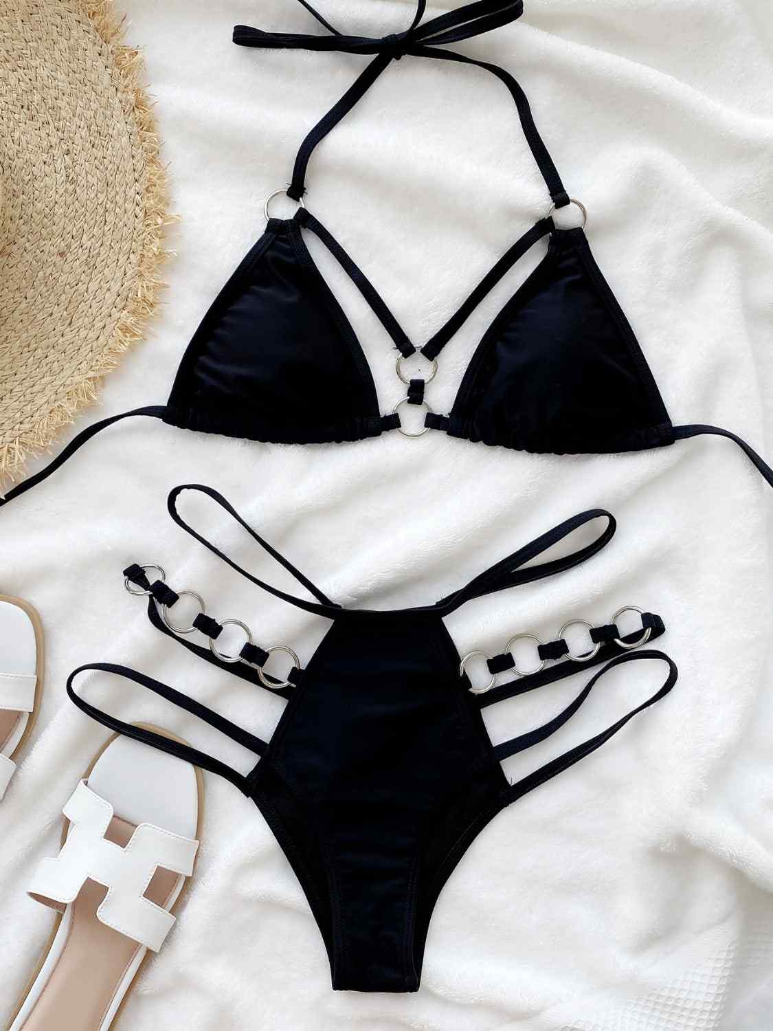 Cutout halter neck two-piece bikini set with removable padding, slightly stretchy fabric, and no underwire.