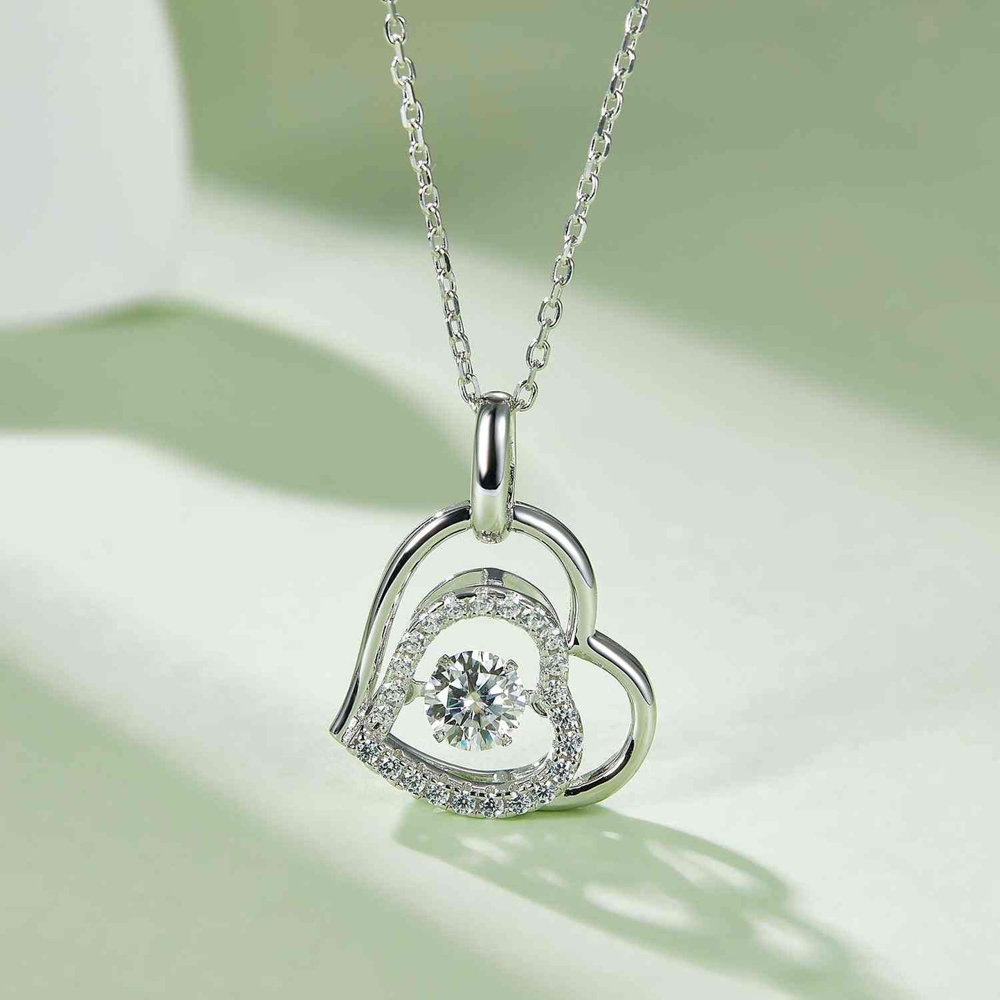 Moissanite 925 sterling silver heart necklace with 0.7 carat stone.