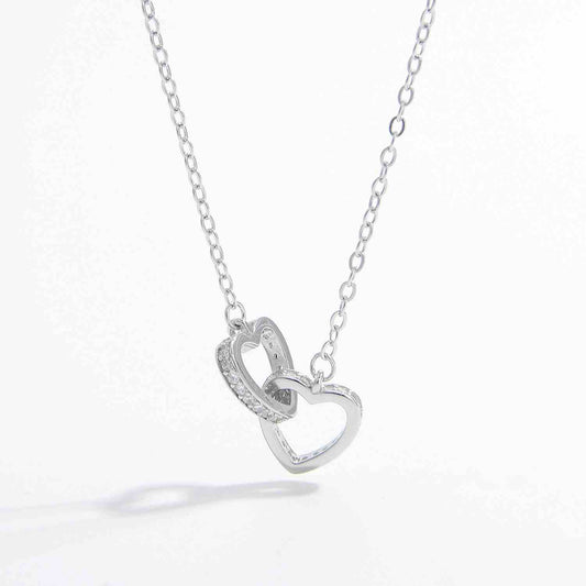 925 Sterling Silver Inlaid Zircon Heart Necklace on a delicate chain.