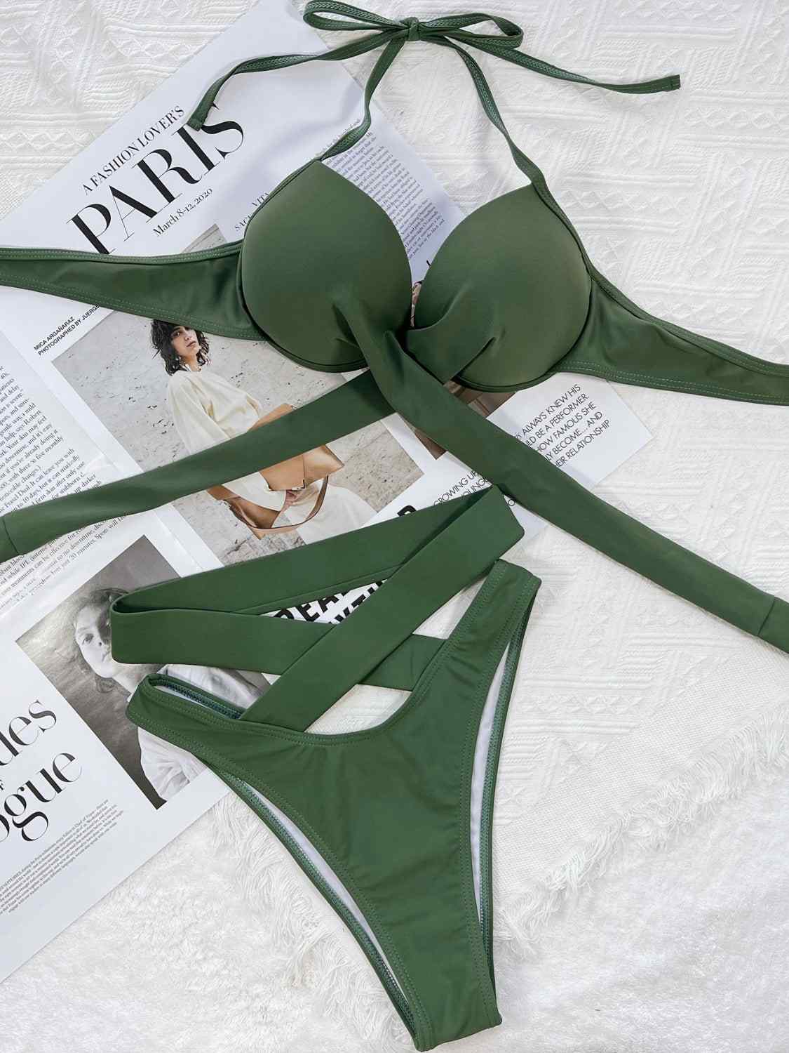 Crisscross halter neck bikini set in green with removable padding, no underwire, stretchy polyester-elastane blend.