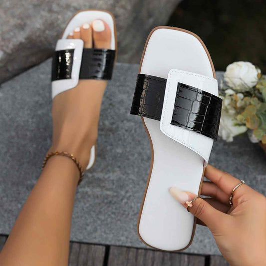 Open toe flats sandals in PU leather with black and white design, perfect for casual wear.