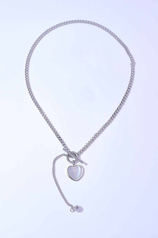 Titanium steel heart necklace with cat's eye stone and silver-plating.