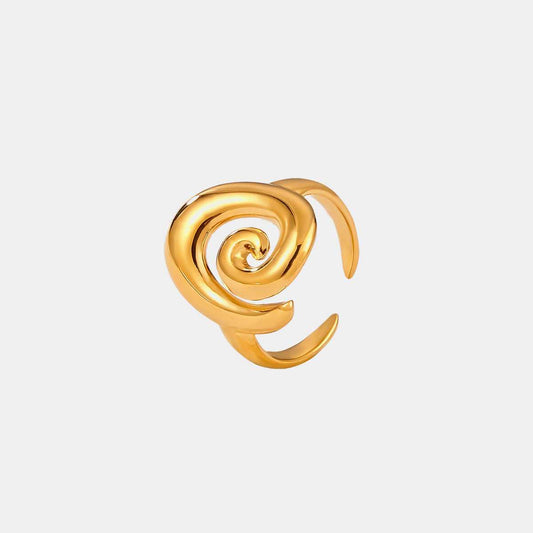 Titanium steel spiral shape ring, gold-plated, one-piece design.