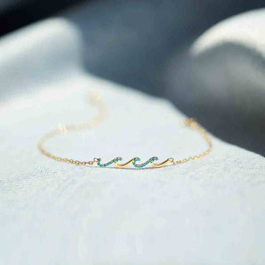 925 Sterling Silver Zircon Bracelet with 18K gold plating on display.