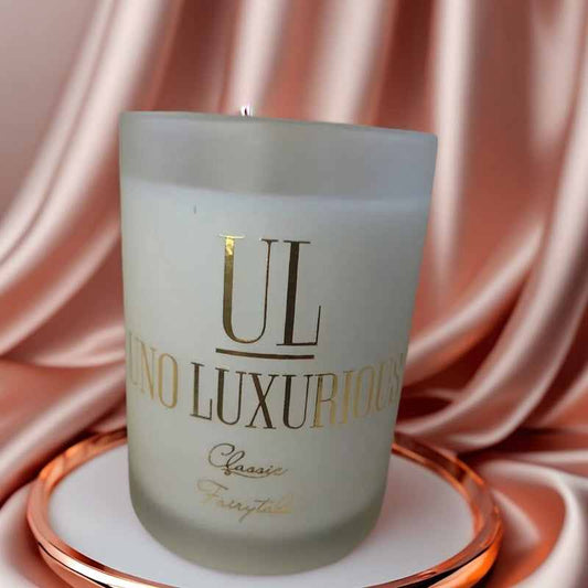 Classic Fairytale candle by Uno Luxurious on elegant silk background.
