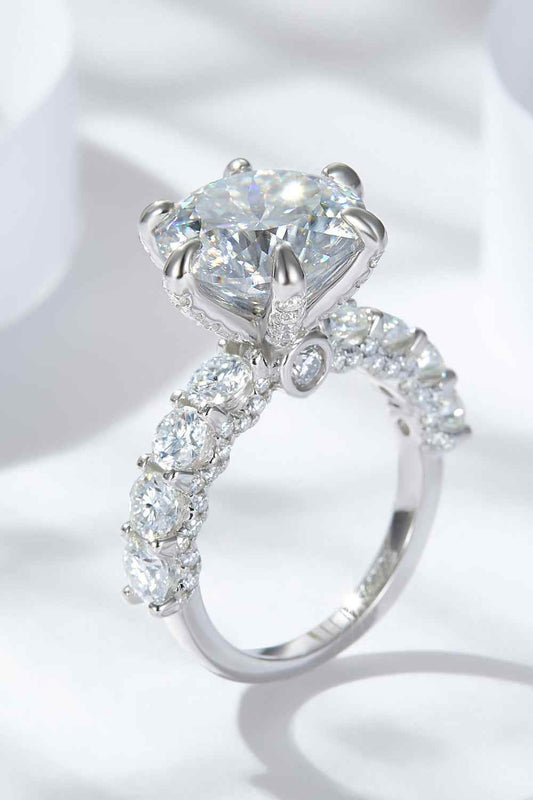 3-carat moissanite platinum-plated side stone ring with minimalist design.
