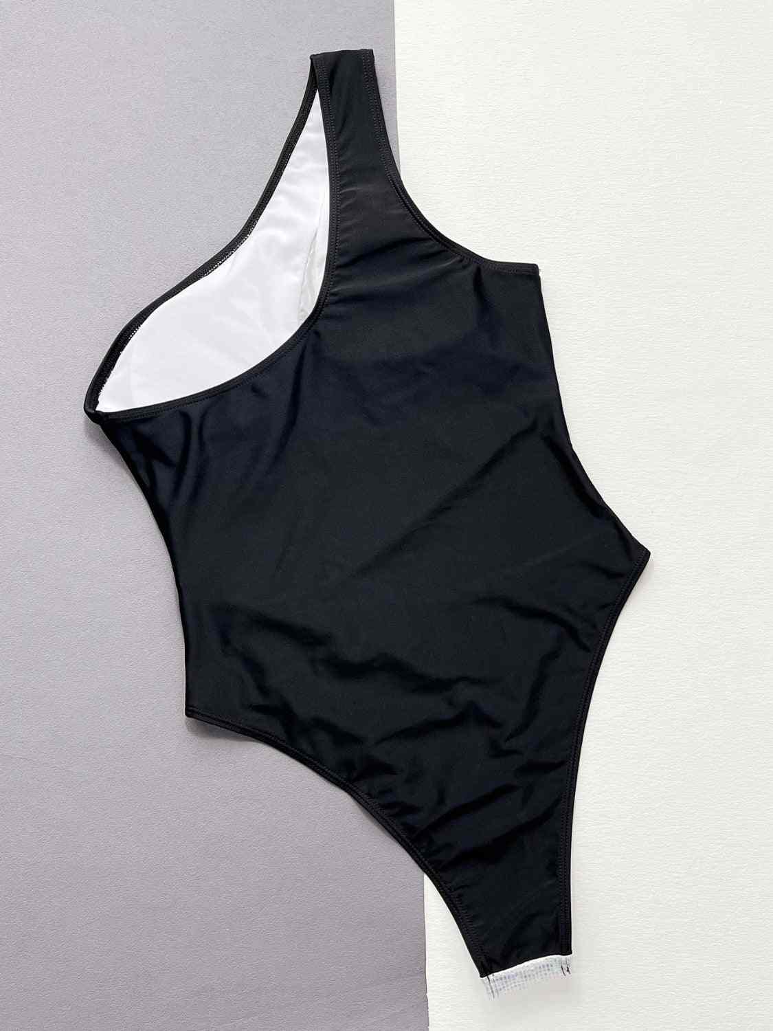 Contrast Panel One-Piece Swimsuit with removable padding, stretchy material, in black and white design.