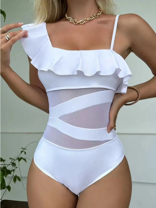 Asymmetrical ruffled one-piece swimwear with removable padding and moderate stretch.