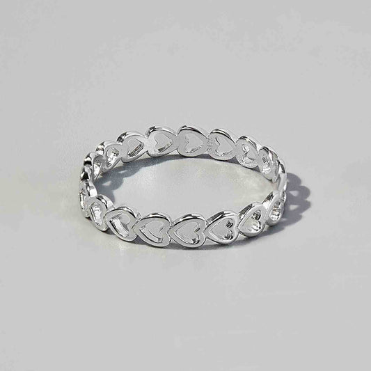 Sterling silver heart link ring with delicate design.