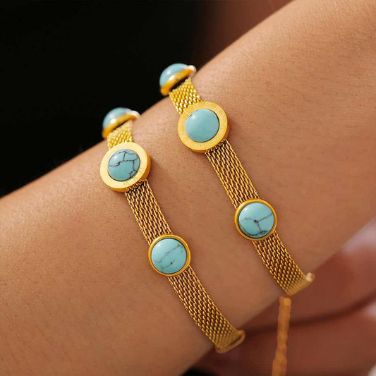 Turquoise Titanium Steel Bracelet with Gold-Plated Accents