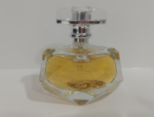 Serenity Golden Crystal room spray bottle with golden liquid, featuring a luxurious scent blend.